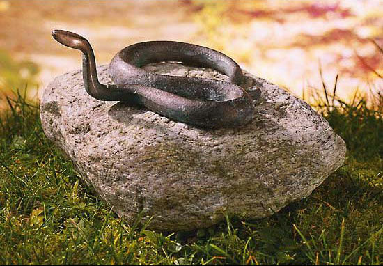 Garden sculpture "Snake", copper on stone