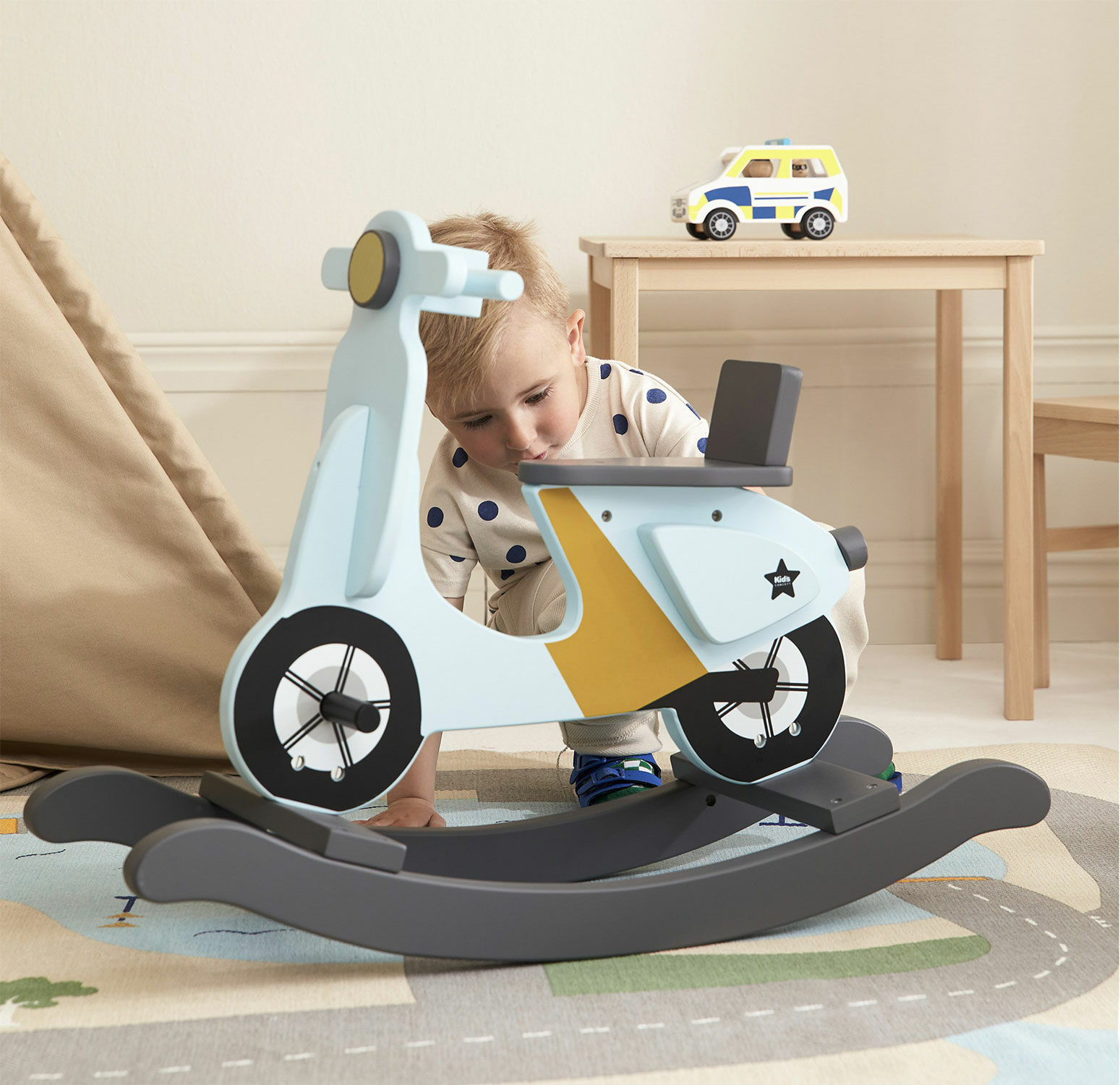 "Rocking Scooter Light Blue" (for children aged 18 months and older) by Kid's Concept