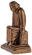 Rzeźba "Czytający uczeń klasztoru" (1930), redukcja w brązie autorstwa Ernst Barlach
