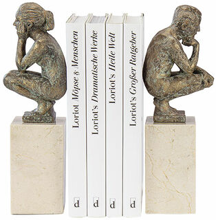 Skulpturpar / bogstøtter "Dreng og pige", støbt stenlook von Angeles Anglada