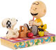 Sculptuur "Snoopy, Woodstock en Charlie op een picknick", gegoten van Jim Shore