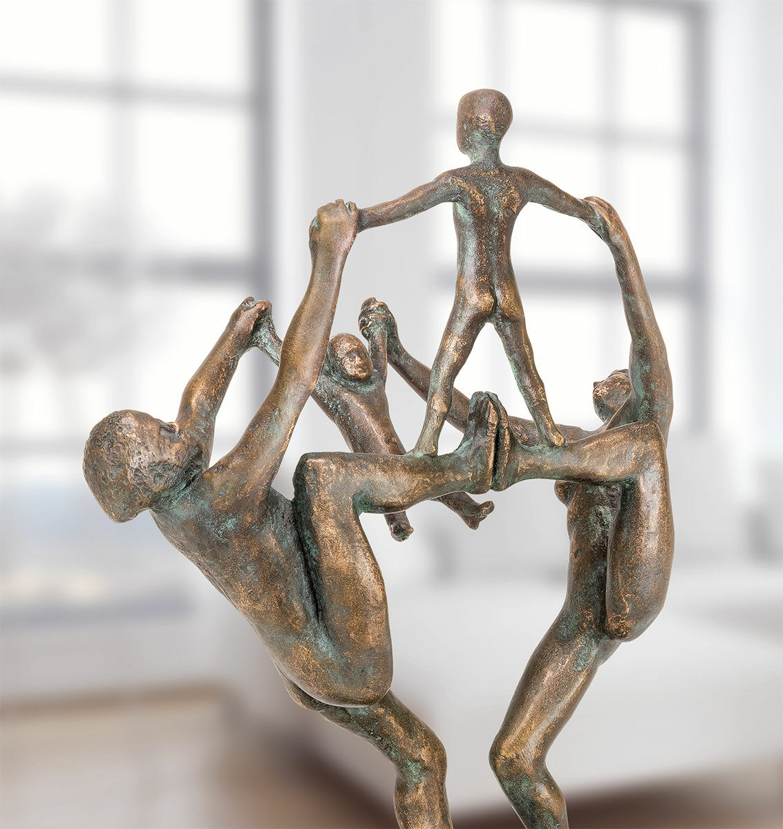 Sculptuur "Familie op wielen", brons von Adelbert Heil