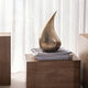 Skulptur "The Tear", brons av Marc Caelenberghe