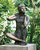 Sculpture de jardin "Garçon assis" (sans socle), bronze