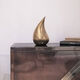 Skulptur "The Tear", brons av Marc Caelenberghe