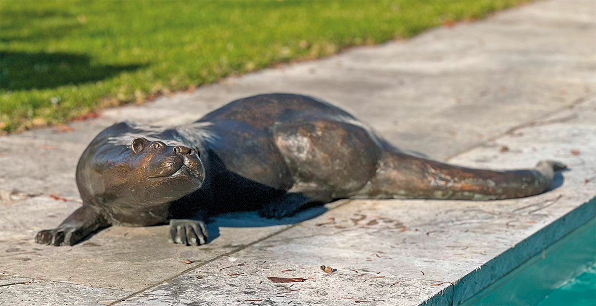 Garden sculpture "Otter", bronze by Kurt Arentz