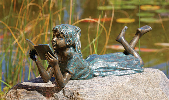 Garden sculpture "Reading Girl", bronze