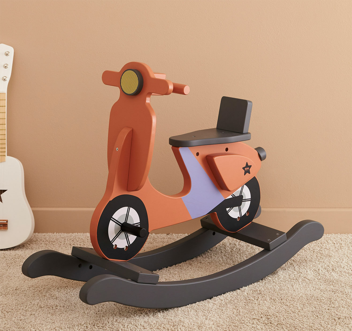 "Rocking Scooter Rust Red" (for children aged 18 months and older) by Kid's Concept