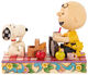 Sculptuur "Snoopy, Woodstock en Charlie op een picknick", gegoten van Jim Shore