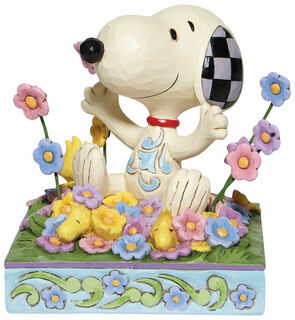 Skulptur "Snoopy im Blumenbett", Kunstguss
